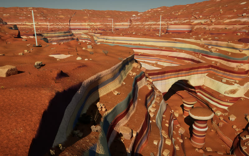 A generated canyon from above the rim: walls banded in red, cream, grey and blue rock drop to the floor, with a natural arch, striped hoodoos, boulders and desert scrub.
